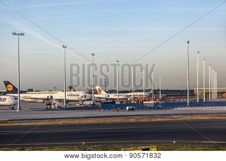 Aircrafts At Lufthansa Technik Wharft At Rhein Main Airport In Sunrise
