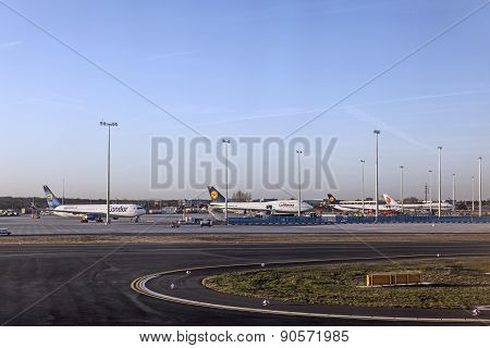 Aircrafts At Lufthansa Technik Wharft At Rhein Main Airport In Sunrise
