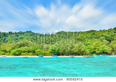 Many Boats On Beautiful Tropical Sand Beach