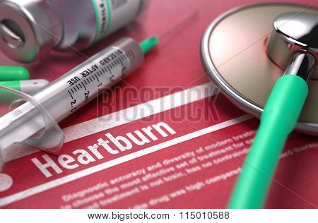 Heartburn - Printed Diagnosis on Red Background.