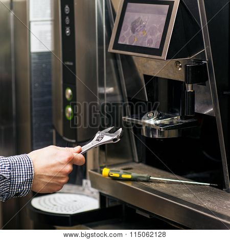 Man going to prerare coffee maker