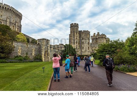 Unidentified Tourists Near Medieval Buildings Inside Windsor Castle