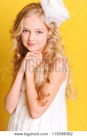 Smiling blonde kid girl