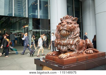 HONG KONG - MAY 06, 2015: Right lion statues of HSBC Main Building. HSBC Holdings plc is a British multinational banking and financial services company headquartered in London, United Kingdom.