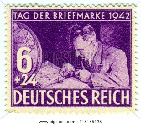GOMEL,BELARUS - JANUARY 2016: A stamp printed in Germany shows image of the German philatelists, circa 1942. 