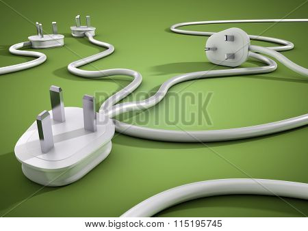 Power plugs lying on bright colored floor unplugged concept for energy and electricity conservation.