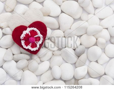 Concept of love, hearts on the white stones