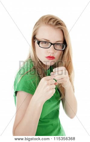 Pretty Young Girl Is Ready To Take A Hit.isolated On White.