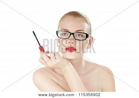 Sexual Beauty Woman In Glasses With Mascara Brush In Hand Over White Background.