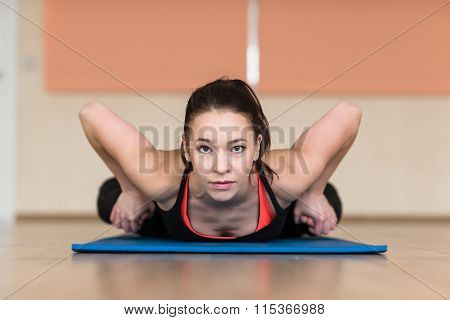 Woman Yoga, Bhekasana, Frog Pose In Gym