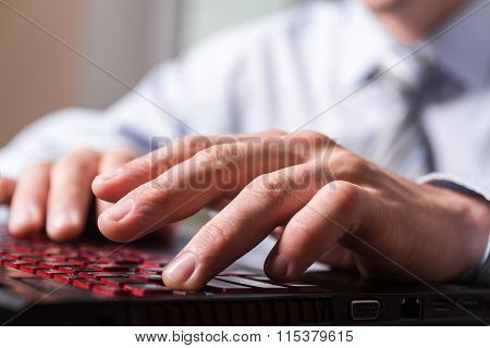 Close-up Fingers On A Computer Keyboard.