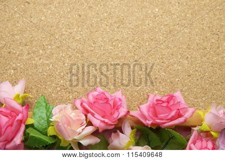 Fabric roses on bulletin board, cork board. Natural background.