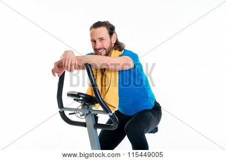 Young Man Train With Fitness Machine