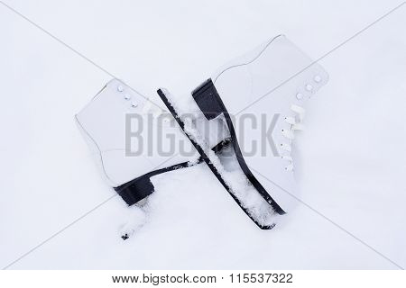 Figure Skates In Snow Close-up