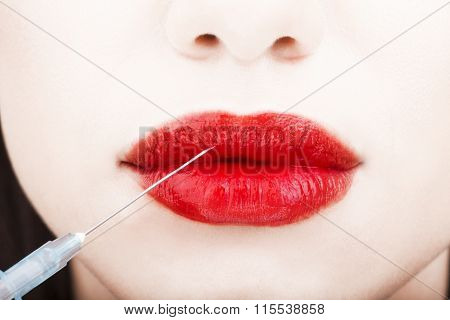 Woman with syringe