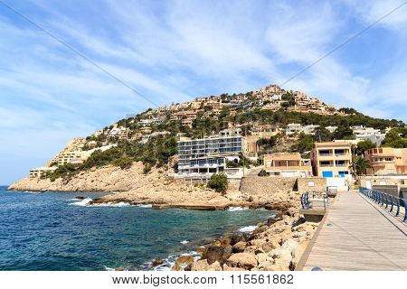 Hill with houses in Port d'Andratx and Mediterranean Sea, Majorca Spain