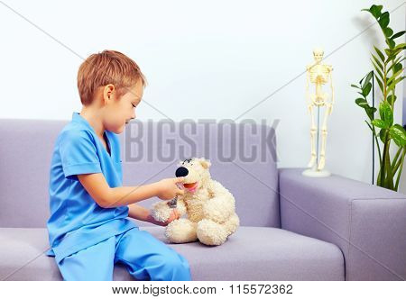 Cute Young Kid Playing A Doctor In Office