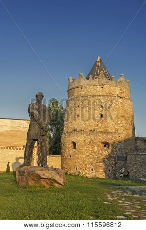 The tower of the caste in Letychiv and the statue of Ustym Karmalyuk - the famous Ukrainian rebel in the 19-th century Ukraine