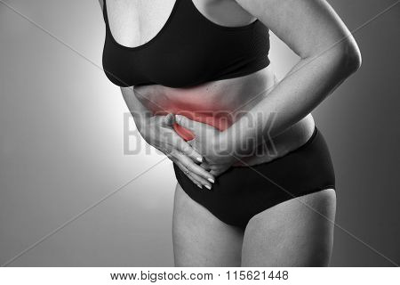 Woman With Abdominal Pain. Pain In The Human Body
