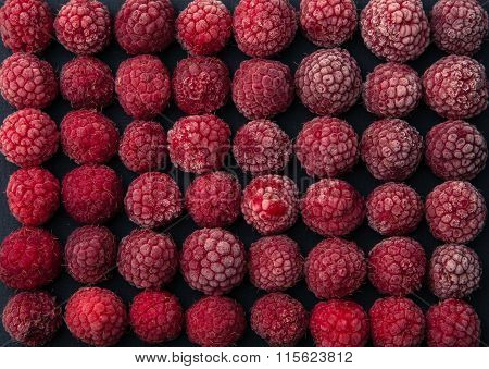 Frozen Raspberry On Black Background