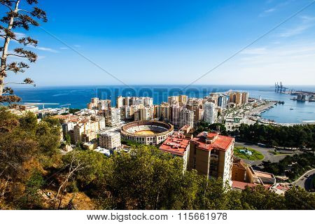 Malaga bullring, port and cityscape