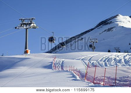 Gondola Lift On Ski Resort At Sun Day