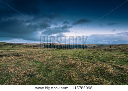 Dramatic Clouds Over Wild Landscape In Devon, Uk