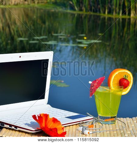 Cocktai With Fruits And Laptop
