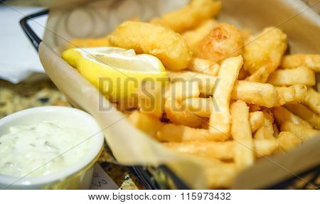 close up french fries with ranch dipping.