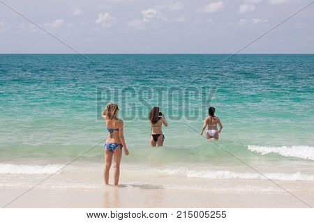 Tourists funny in the blue sea at PhuketThailand
