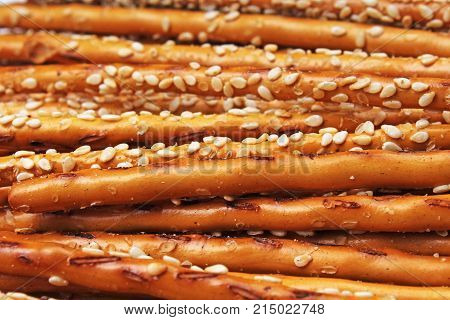 Bread sticks cracker texture pattern. Salted bread sticks as background.