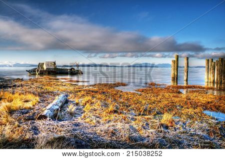 A boat is ship wrecked in Samish Bay near Bellingham, WA.