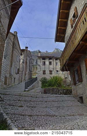 A small street in the hill village of Erto in Friuli Venezia Giulia north east Italy. The village is famous locally for having being evacuated following the 1963 Vajont Dam disaster.
