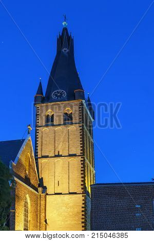 St Lambertus church is Roman Catholic church in Dusseldorf historic center Germany. Tower in Evening