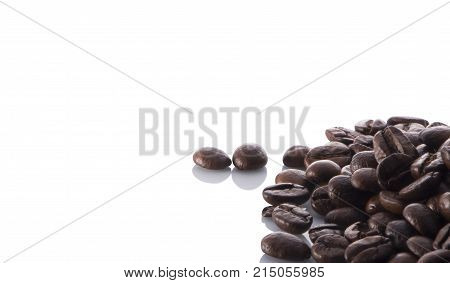 texture of coffee, with beautiful patches of light on the surface of grains texture