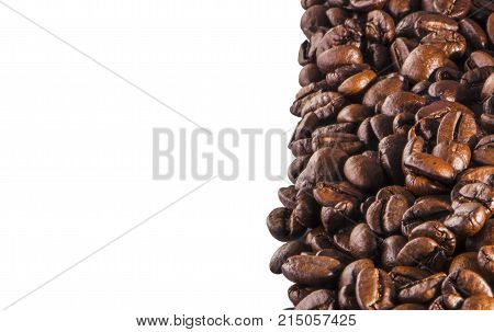 texture of coffee, with beautiful patches of light on the surface of grains texture