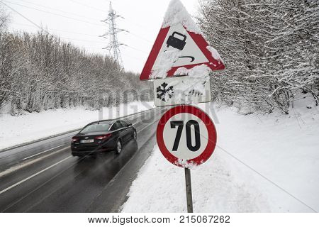 traffic sign and fresh snow