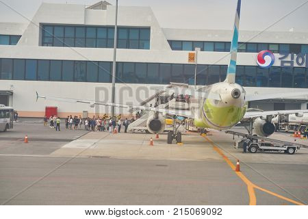 BUSAN, SOUTH KOREA - CIRCA MAY, 2017: aircraft stand on the tarmac at Gimhae International Airport.