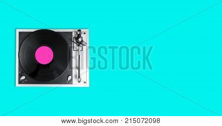 Aerial view top down onto a vinyl record on vintage hi-fi stereo disc turntable