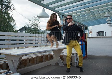 Couple Of Dancers Dancing Bachata On A City Street