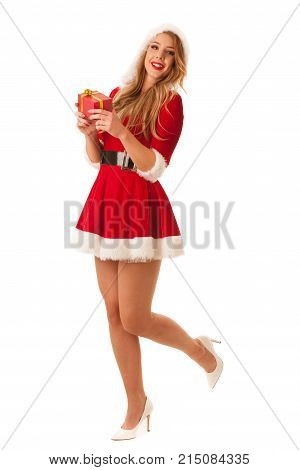 Full Length Portrait Of A Woman In Santa Calus Dress Holding A Present Isolated Over White Backgroun