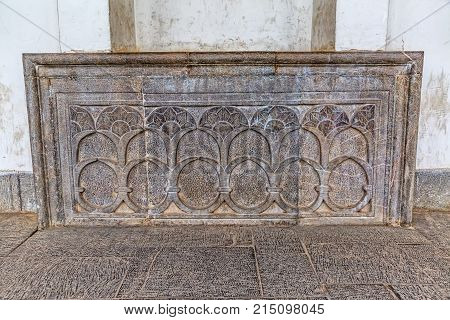 Facade ornament carved in stone on Zoroastrian Fire Temple Complex in old city Yazd, Iran.