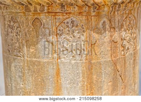 Detail of the marble pillar remains in front of the Yame mosque in old city Yazd in Iran.