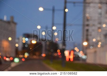 Abstract bokeh light and blurred building in the city background