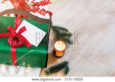 Homemade Wrapped Christmas Present With Tools And Decorations. Top View. Packing Christmas Gifts.