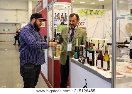CRACOW POLAND - NOVEMBER 16 2017: International Wine Trade Fair ENOEXPO in Cracow. Producers of wine from all around the world meet the importers distributors and representatives. Cracow. Poland