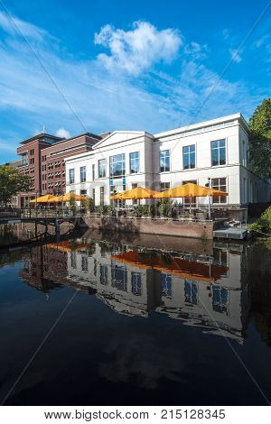 White Roman Like Building At The Canal Side With The Bridge Entrance The Hague Netherlands