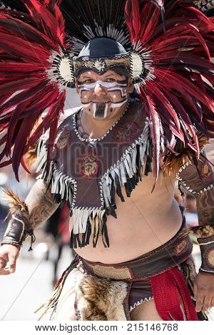 March 6, 2016 San Miguel de Allende Mexico: indigenous man wearing traditional head dress AND COSTUME at the Senior de la Conquista dance celebration