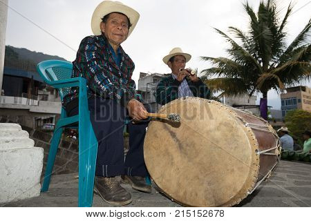 March 23, 2016 San Pedro la Laguna, Guatemala: musicians in the the front of the local christian church performing during Easter celebration week
