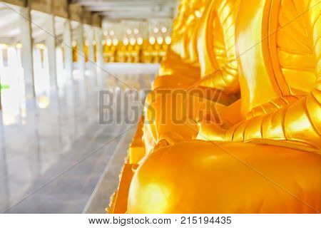 Golden Buddha statue meditation in measure Thailand.